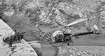 Les restes du barrage de Malpasset avec l'Alouette 2 F-BIFM venue de la Base de Grenoble-Eybens et le Bell 47 G2 F-BHMG de la Protection civile en approche - Photo © Philippe Le Tellier