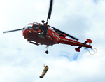 Hélitreuillage d'une civière Piguillem depuis une Alouette III de la Sécurité civile - Photo DR