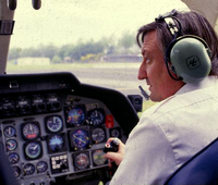 Jean-Marie Potelle aux commandes d'un Agusta A.109 - Photo DR collection JMP