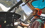 Pascal Brun aux commandes de son AS350 B3 - Photo DR CMBH
