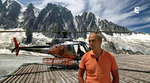 Pascal Brun interviewé et son AS 350 B3e F-HESB en arrière-plan posé sur le refuge d'Argentière dans le massif du Mont-Blanc - Photo France 3 Rhône-Alpes