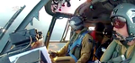 Le commandant Cécile Dumont d'Ayot aux commandes d'un Lynx de la Marine nationale - Photo DR