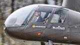 Michel de Rohozinski et son R44 – Photo © Patrick Gisle